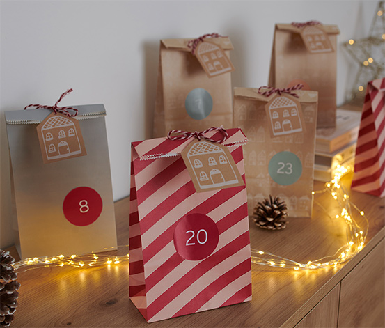 Vytiskněte dětem vánoční pohádku na 24 částí a zabalte ji do adventního  kalendáře – Tchibo